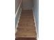 Carpeted staircase with blue walls at 2159 Martin Luther King, Jr. Dr, Atlanta, GA 30310
