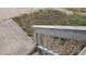 View of wooden handrail and balusters showing damage and wear at 2159 Martin Luther King, Jr. Dr, Atlanta, GA 30310