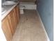 Bathroom with tiled floor and wooden vanity at 2159 Martin Luther King, Jr. Dr, Atlanta, GA 30310