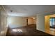 Bright living room featuring carpet and access to other rooms at 3010 Parc Lorraine, Lithonia, GA 30038