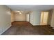 Open living room with a neutral color palette and ceiling fan at 3010 Parc Lorraine, Lithonia, GA 30038