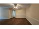 Bright living room featuring carpet and a ceiling fan at 3010 Parc Lorraine, Lithonia, GA 30038