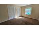 Bright bedroom featuring double closets and wall-to-wall carpet at 3010 Parc Lorraine, Lithonia, GA 30038