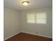 Bright bedroom with wood flooring and window at 1142 Hembree Ln, Austell, GA 30168