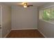 Simple dining room with hardwood floors and neutral walls at 1142 Hembree Ln, Austell, GA 30168