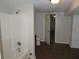 Basement bathroom with shower/tub combo at 1142 Hembree Ln, Austell, GA 30168