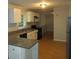 Kitchen with granite countertops and white cabinets at 1142 Hembree Ln, Austell, GA 30168