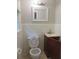 Clean bathroom with toilet, sink, and vanity at 1142 Hembree Ln, Austell, GA 30168