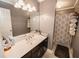 Clean bathroom with vanity, sink, and shower at 377 Mill Ridge Way, Lawrenceville, GA 30046
