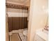 Clean bathroom with shower, toilet, and tiled floor at 377 Mill Ridge Way, Lawrenceville, GA 30046