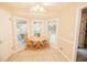 Charming breakfast nook with bay window and small table at 377 Mill Ridge Way, Lawrenceville, GA 30046