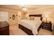 Large main bedroom with king-size bed and ample space at 377 Mill Ridge Way, Lawrenceville, GA 30046