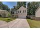 Two-story brick home with a front porch and yard at 2248 Annes Lake Cir, Lithonia, GA 30058
