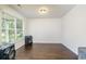 Home office space with hardwood floors and large window providing natural light at 2248 Annes Lake Cir, Lithonia, GA 30058