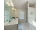 Clean bathroom with double vanity, soaking tub, and shower at 2248 Annes Lake Cir, Lithonia, GA 30058