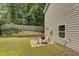 Small backyard with patio and grill at 2248 Annes Lake Cir, Lithonia, GA 30058
