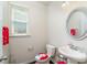 Clean bathroom with a white vanity and a mirrored medicine cabinet at 2248 Annes Lake Cir, Lithonia, GA 30058