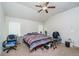 Bright bedroom featuring a king-size bed and vaulted ceiling at 2248 Annes Lake Cir, Lithonia, GA 30058