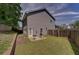 Fenced backyard with patio and grill at 2248 Annes Lake Cir, Lithonia, GA 30058
