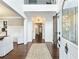 Bright entryway with wood floors, shiplap walls, and a rustic barn door at 3965 Hamilton View Way, Dacula, GA 30019