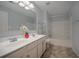 Bathroom boasts double vanity and a relaxing bathtub at 2100 Meadow Peak Rd, Duluth, GA 30097