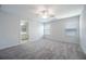 Bright bedroom featuring carpet and an ensuite bathroom at 2100 Meadow Peak Rd, Duluth, GA 30097