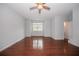 Spacious bedroom with hardwood floors and ceiling fan at 2100 Meadow Peak Rd, Duluth, GA 30097