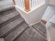 Gray carpeting covers the stairs leading to the second floor at 2100 Meadow Peak Rd, Duluth, GA 30097
