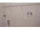 Laundry area with shelving and hookups for washer/dryer at 2100 Meadow Peak Rd, Duluth, GA 30097