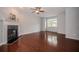 Living room with hardwood floors and fireplace at 2100 Meadow Peak Rd, Duluth, GA 30097