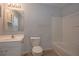 Clean bathroom with a white vanity and bathtub at 2100 Meadow Peak Rd, Duluth, GA 30097