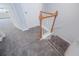 Carpeted stairs with wooden railing and banister at 2100 Meadow Peak Rd, Duluth, GA 30097