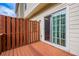 Step outside onto the deck from the sliding glass door at 2100 Meadow Peak Rd, Duluth, GA 30097