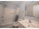 Clean bathroom with tub/shower combo and vanity at 2100 Meadow Peak Rd, Duluth, GA 30097