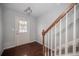 Entryway with hardwood floors and staircase to upper level at 2100 Meadow Peak Rd, Duluth, GA 30097