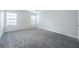 Spacious bedroom with carpet and neutral walls at 2100 Meadow Peak Rd, Duluth, GA 30097