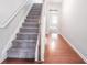 Carpeted staircase leading to the second floor at 2100 Meadow Peak Rd, Duluth, GA 30097
