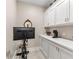 Home gym with stationary bike and monitor at 105 Summerlin Dr, Canton, GA 30115