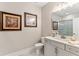 Clean bathroom with a vanity, toilet and shower at 105 Summerlin Dr, Canton, GA 30115
