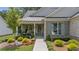 Craftsman style home with stone accents and landscaped front yard at 105 Summerlin Dr, Canton, GA 30115