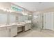 Spa-like bathroom with double vanity, large shower, and window at 105 Summerlin Dr, Canton, GA 30115