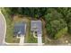 Aerial view of two houses in a wooded area at 105 Summerlin Dr, Canton, GA 30115