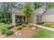 Two-story home with stone and shingle siding, plus a landscaped yard at 105 Summerlin Dr, Canton, GA 30115