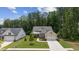 Aerial view of house with a large front yard at 105 Summerlin Dr, Canton, GA 30115