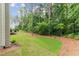 Landscaped backyard with wooded privacy at 105 Summerlin Dr, Canton, GA 30115