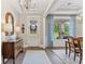 Elegant entryway with hardwood floors, chandelier, and console table at 105 Summerlin Dr, Canton, GA 30115