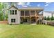 House exterior with large backyard and screened porch at 105 Summerlin Dr, Canton, GA 30115