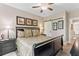 Spacious primary bedroom with a king-size bed and ensuite bathroom at 105 Summerlin Dr, Canton, GA 30115