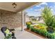 Relaxing front porch with stone wall and view of neighborhood at 105 Summerlin Dr, Canton, GA 30115