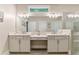 Elegant bathroom with double vanity and a large walk-in shower at 105 Summerlin Dr, Canton, GA 30115